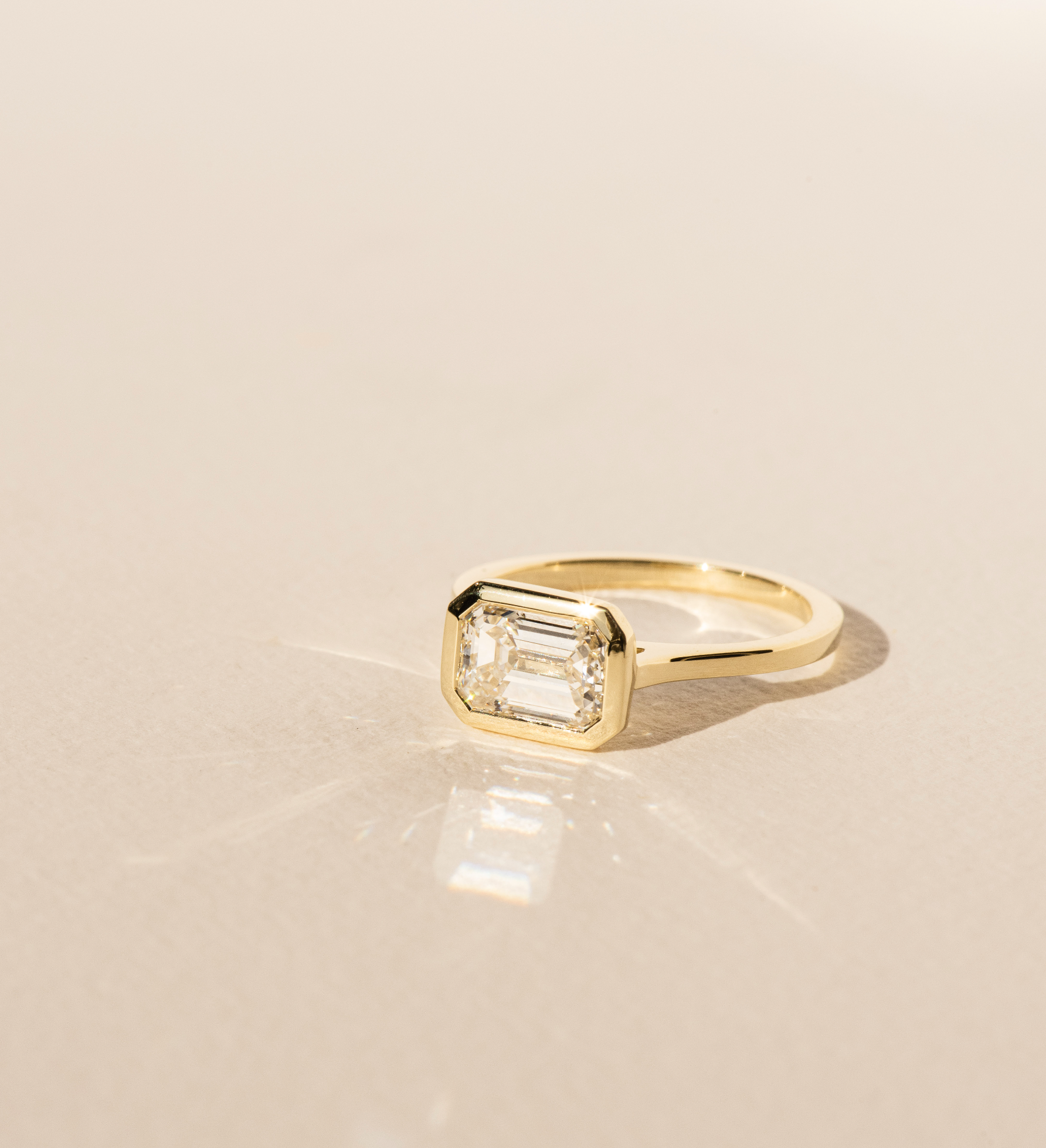 Dean & Dust Bespoke Jewellery Diamond Engagement Ring - Emerald Cut Diamond in Yellow Gold