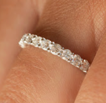 Shared Claw Set Diamond Ring